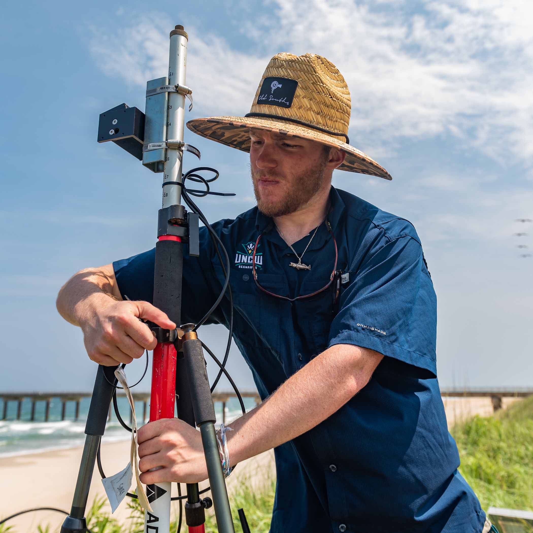Coastal Engineering students install LiDAR instruments along the beach.